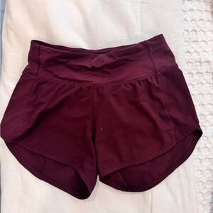 Lululemon Speed Up Shorts (4 inch)
Size 2
Color is maroon